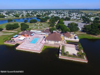 You have to check this one out! Chipewa Drive is one the BEST on Barefoot Bay Golf Course in Florida - for sale on GolfHomes.com, golf home, golf lot