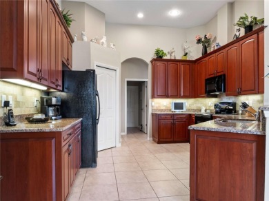 Experience SPECTACULAR SUNSETS & Golf Course Living from this on Lake Jovita Golf and Country Club in Florida - for sale on GolfHomes.com, golf home, golf lot