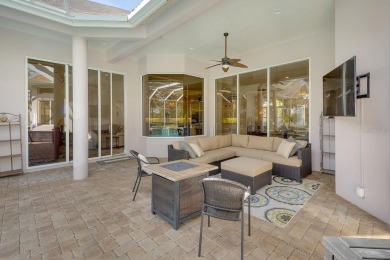 This Arthur Rutenberg built home is situated on a wooded double on River Wilderness Golf and Country Club in Florida - for sale on GolfHomes.com, golf home, golf lot