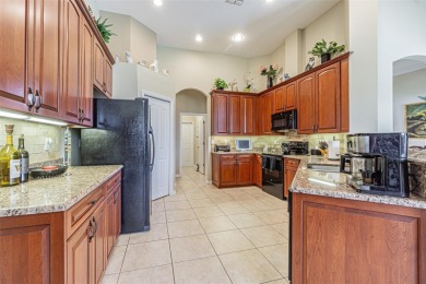 Experience SPECTACULAR SUNSETS & Golf Course Living from this on Lake Jovita Golf and Country Club in Florida - for sale on GolfHomes.com, golf home, golf lot