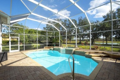 This Arthur Rutenberg built home is situated on a wooded double on River Wilderness Golf and Country Club in Florida - for sale on GolfHomes.com, golf home, golf lot