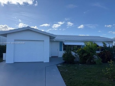 Beautifully updated single family home in Boynton Beach's on Leisureville Community Golf Course in Florida - for sale on GolfHomes.com, golf home, golf lot