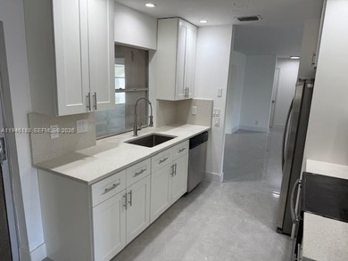 Beautifully updated single family home in Boynton Beach's on Leisureville Community Golf Course in Florida - for sale on GolfHomes.com, golf home, golf lot