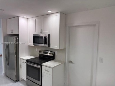 Beautifully updated single family home in Boynton Beach's on Leisureville Community Golf Course in Florida - for sale on GolfHomes.com, golf home, golf lot