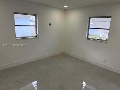 Beautifully updated single family home in Boynton Beach's on Leisureville Community Golf Course in Florida - for sale on GolfHomes.com, golf home, golf lot