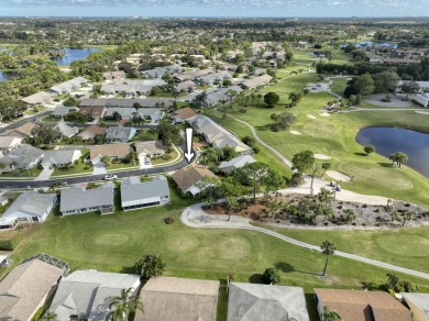 An exceptional property in a loved & manicured neighborhood on The Golf Club of Jupiter in Florida - for sale on GolfHomes.com, golf home, golf lot