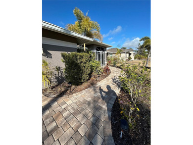 Welcome to this immaculate move in ready home on a double lot on Rotonda Golf and Country Club The Palms Course in Florida - for sale on GolfHomes.com, golf home, golf lot