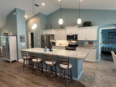 Welcome to this immaculate move in ready home on a double lot on Rotonda Golf and Country Club The Palms Course in Florida - for sale on GolfHomes.com, golf home, golf lot