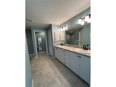 Welcome to this immaculate move in ready home on a double lot on Rotonda Golf and Country Club The Palms Course in Florida - for sale on GolfHomes.com, golf home, golf lot