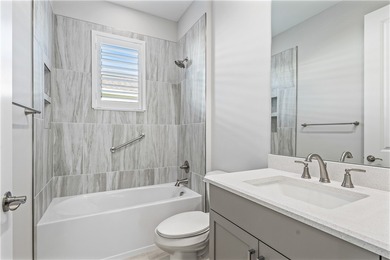 This sophisticated lakefront residence in The Falls at Grand on Oak Harbor Country Club in Florida - for sale on GolfHomes.com, golf home, golf lot