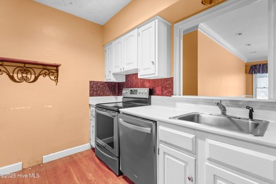 Welcome to this spacious townhouse offering incredible potential on Country Club of North Carolina in North Carolina - for sale on GolfHomes.com, golf home, golf lot