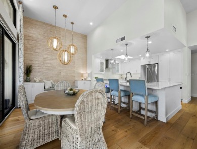 Located behind the gates of the prestigious Bay Isles, this on Longboat Key Golf Club Resort in Florida - for sale on GolfHomes.com, golf home, golf lot