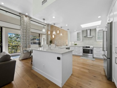 Located behind the gates of the prestigious Bay Isles, this on Longboat Key Golf Club Resort in Florida - for sale on GolfHomes.com, golf home, golf lot