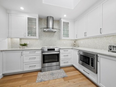 Located behind the gates of the prestigious Bay Isles, this on Longboat Key Golf Club Resort in Florida - for sale on GolfHomes.com, golf home, golf lot