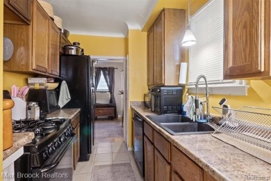 Discover this inviting 2-bed, 2-bath home that blends character on Evergreen Hills Golf Course in Michigan - for sale on GolfHomes.com, golf home, golf lot