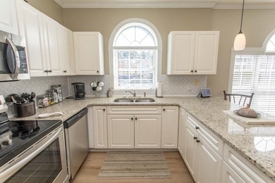 This rare ground floor, end unit has lots of natural light on  in South Carolina - for sale on GolfHomes.com, golf home, golf lot