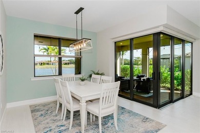 ZERO-CORNER SLIDERS - POND VIEW - 2.5-CAR GARAGE - TILE on Panther Run Golf Club in Florida - for sale on GolfHomes.com, golf home, golf lot