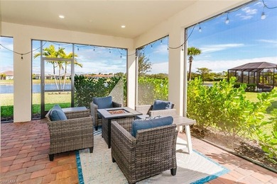 ZERO-CORNER SLIDERS - POND VIEW - 2.5-CAR GARAGE - TILE on Panther Run Golf Club in Florida - for sale on GolfHomes.com, golf home, golf lot