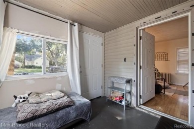 Discover this inviting 2-bed, 2-bath home that blends character on Evergreen Hills Golf Course in Michigan - for sale on GolfHomes.com, golf home, golf lot