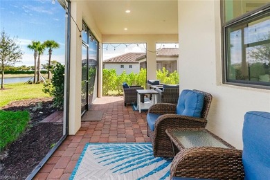 ZERO-CORNER SLIDERS - POND VIEW - 2.5-CAR GARAGE - TILE on Panther Run Golf Club in Florida - for sale on GolfHomes.com, golf home, golf lot