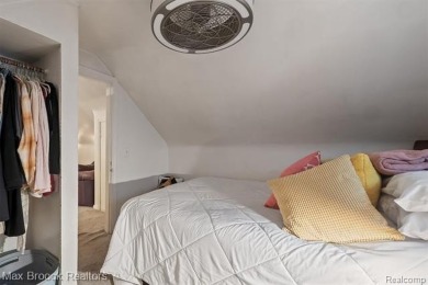 Discover this inviting 2-bed, 2-bath home that blends character on Evergreen Hills Golf Course in Michigan - for sale on GolfHomes.com, golf home, golf lot