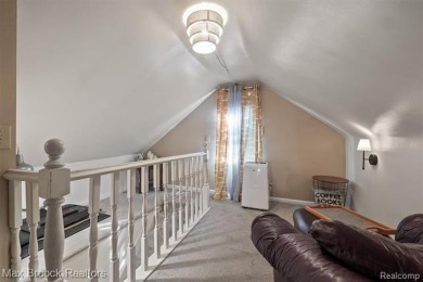 Discover this inviting 2-bed, 2-bath home that blends character on Evergreen Hills Golf Course in Michigan - for sale on GolfHomes.com, golf home, golf lot