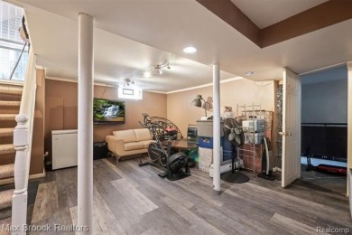 Discover this inviting 2-bed, 2-bath home that blends character on Evergreen Hills Golf Course in Michigan - for sale on GolfHomes.com, golf home, golf lot