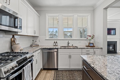 Set on a peaceful pond homesite in the Lochton subsection of on Cypress Point Par 3 in South Carolina - for sale on GolfHomes.com, golf home, golf lot