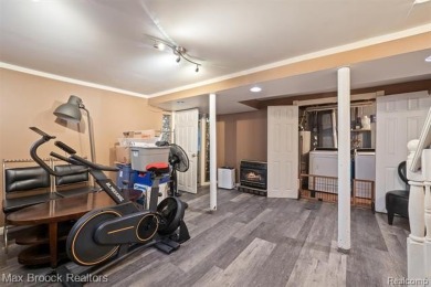 Discover this inviting 2-bed, 2-bath home that blends character on Evergreen Hills Golf Course in Michigan - for sale on GolfHomes.com, golf home, golf lot