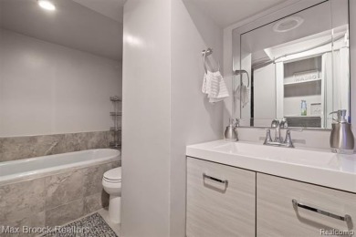 Discover this inviting 2-bed, 2-bath home that blends character on Evergreen Hills Golf Course in Michigan - for sale on GolfHomes.com, golf home, golf lot