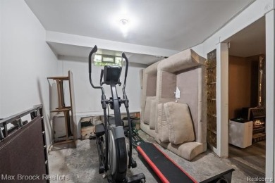 Discover this inviting 2-bed, 2-bath home that blends character on Evergreen Hills Golf Course in Michigan - for sale on GolfHomes.com, golf home, golf lot