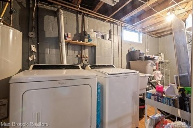 Discover this inviting 2-bed, 2-bath home that blends character on Evergreen Hills Golf Course in Michigan - for sale on GolfHomes.com, golf home, golf lot