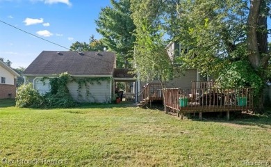 Discover this inviting 2-bed, 2-bath home that blends character on Evergreen Hills Golf Course in Michigan - for sale on GolfHomes.com, golf home, golf lot