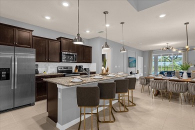This professionally designed, fully furnished 7-bedroom, 5 on Highlands Reserve Golf Club in Florida - for sale on GolfHomes.com, golf home, golf lot