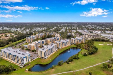 This stunning home is near-perfect and beautiful, boasting on East Bay Golf Club in Florida - for sale on GolfHomes.com, golf home, golf lot