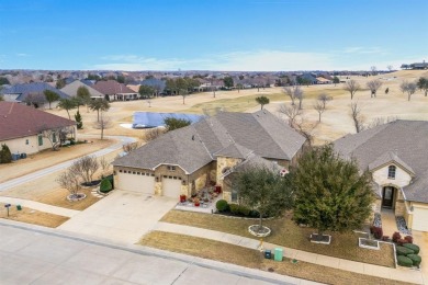 Stunning brick and stone Navarro home with Casita. Set on the on Wildhorse Golf Club of Robson Ranch in Texas - for sale on GolfHomes.com, golf home, golf lot