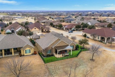 Stunning brick and stone Navarro home with Casita. Set on the on Wildhorse Golf Club of Robson Ranch in Texas - for sale on GolfHomes.com, golf home, golf lot