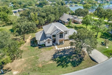 Nestled majestically on the coveted shores of private and secure on Lake Kiowa Golf Course in Texas - for sale on GolfHomes.com, golf home, golf lot