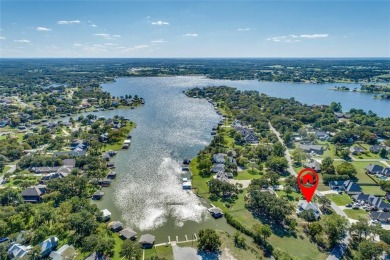 Nestled majestically on the coveted shores of private and secure on Lake Kiowa Golf Course in Texas - for sale on GolfHomes.com, golf home, golf lot