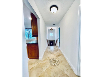 Nestled within the pristine gated community of Boca Pointe, this on Boca Pointe Country Club in Florida - for sale on GolfHomes.com, golf home, golf lot