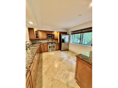 Nestled within the pristine gated community of Boca Pointe, this on Boca Pointe Country Club in Florida - for sale on GolfHomes.com, golf home, golf lot