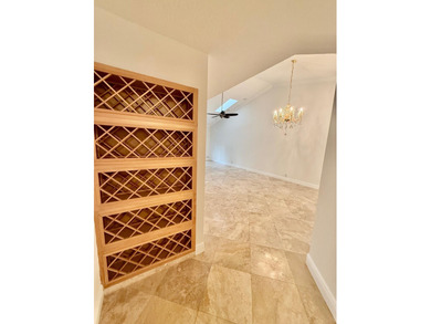 Nestled within the pristine gated community of Boca Pointe, this on Boca Pointe Country Club in Florida - for sale on GolfHomes.com, golf home, golf lot