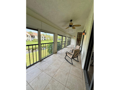 Nestled within the pristine gated community of Boca Pointe, this on Boca Pointe Country Club in Florida - for sale on GolfHomes.com, golf home, golf lot