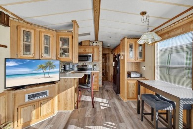 Experience the charm of relaxed Florida living in this lovingly on Del Tura Golf and Country Club in Florida - for sale on GolfHomes.com, golf home, golf lot