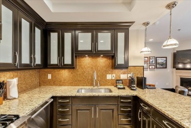 This luxury Waldorf Astoria condominium is set in the Canyons on Canyons Golf Course in Utah - for sale on GolfHomes.com, golf home, golf lot