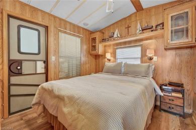 Experience the charm of relaxed Florida living in this lovingly on Del Tura Golf and Country Club in Florida - for sale on GolfHomes.com, golf home, golf lot