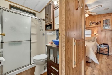 Experience the charm of relaxed Florida living in this lovingly on Del Tura Golf and Country Club in Florida - for sale on GolfHomes.com, golf home, golf lot