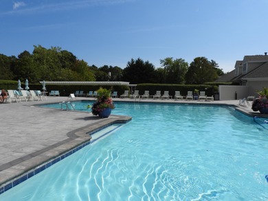 On the 6th hole at Southport, this turn-key ''Vineyard'' on The Golf Club At Southport in Massachusetts - for sale on GolfHomes.com, golf home, golf lot