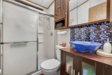 Experience the charm of relaxed Florida living in this lovingly on Del Tura Golf and Country Club in Florida - for sale on GolfHomes.com, golf home, golf lot