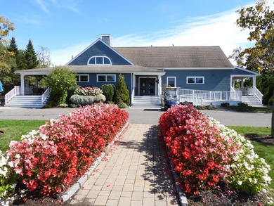 On the 6th hole at Southport, this turn-key ''Vineyard'' on The Golf Club At Southport in Massachusetts - for sale on GolfHomes.com, golf home, golf lot